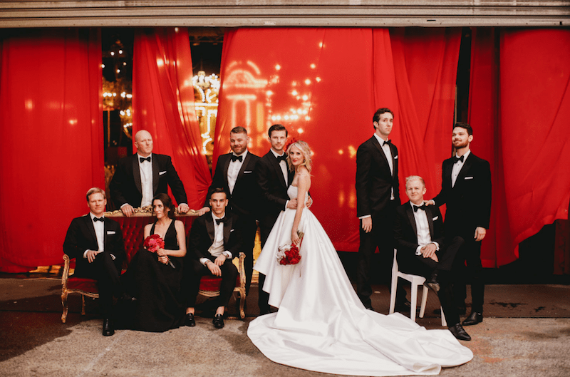 bridal party in historic wedding venue