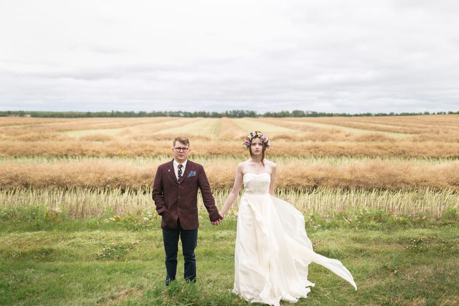 DIY-Rustic-Farmyard-Barn-bride-and-groom-field