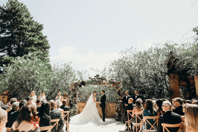 French Estate Formal Wedding bride and groom at altar