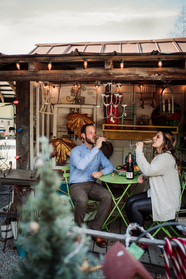 Vintage-village-christmas-themed-engagement-drink-champagne