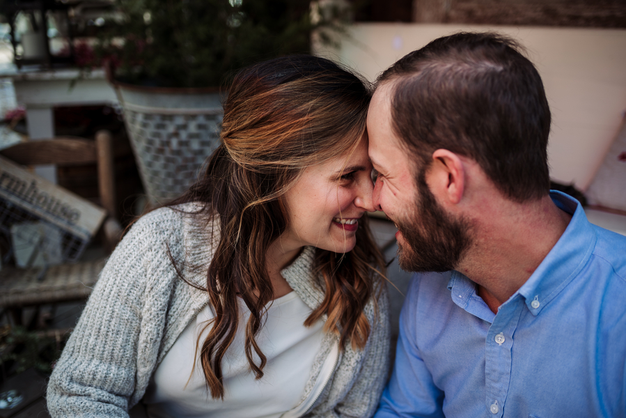 Vintage-village-christmas-themed-engagement-eskimo-kisses