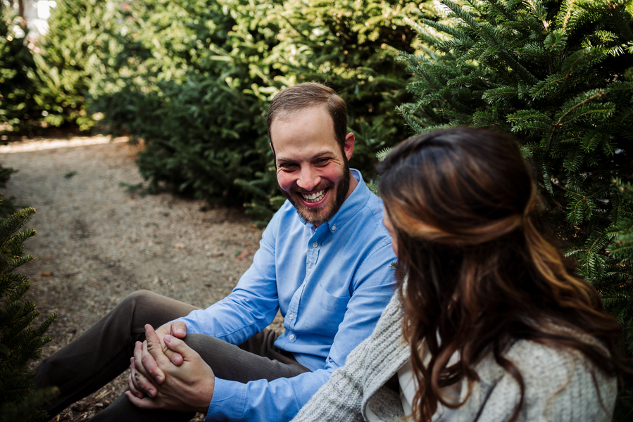 Vintage-village-christmas-themed-engagement-groom-smiles