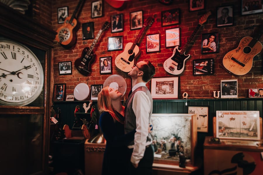 moody-antique-store-engagement-shoot-music-store