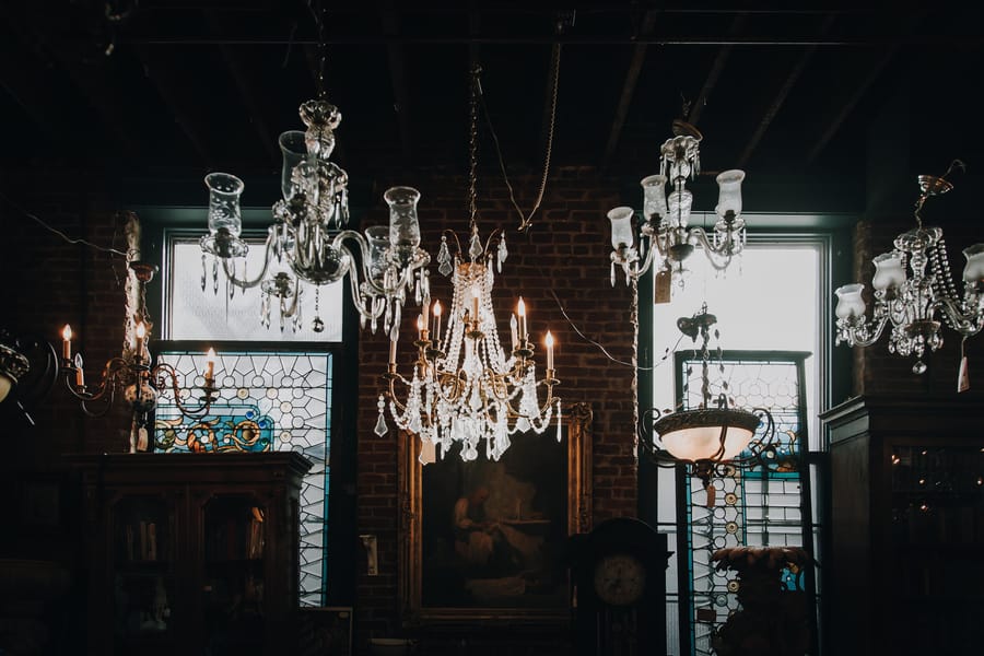 moody-antique-store-engagement-shoot-vintage-chandeliers