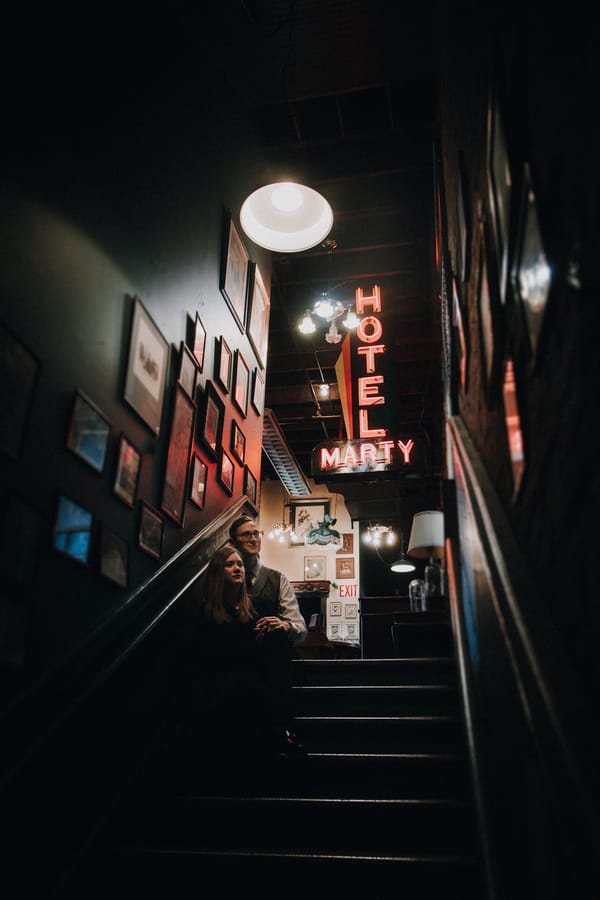 moody-antique-store-engagement-shoot-vintage-neon-sign