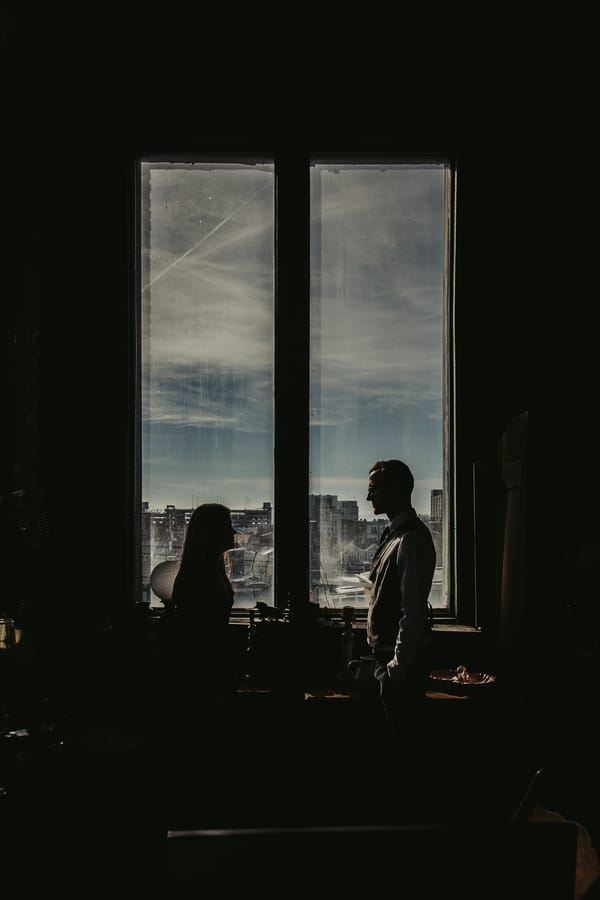 moody-antique-store-engagement-shoot-window