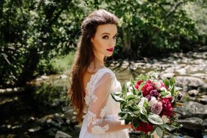 vintage forest styled shoot bride over shoulder