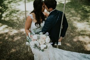 english-garden-fairytale-wedding-swing-couple